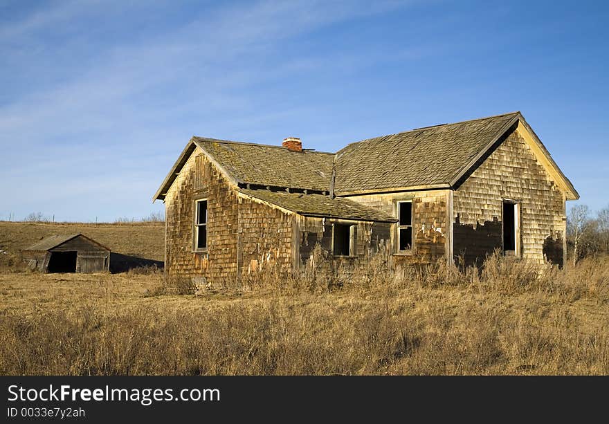 An abandoned farmhouse. An abandoned farmhouse