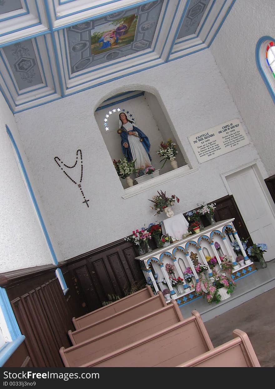 This image depicts the interior of a small church. This image depicts the interior of a small church.