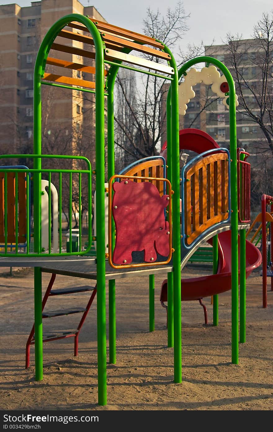 Colorful Playground in winter time on a sunny day. Colorful Playground in winter time on a sunny day