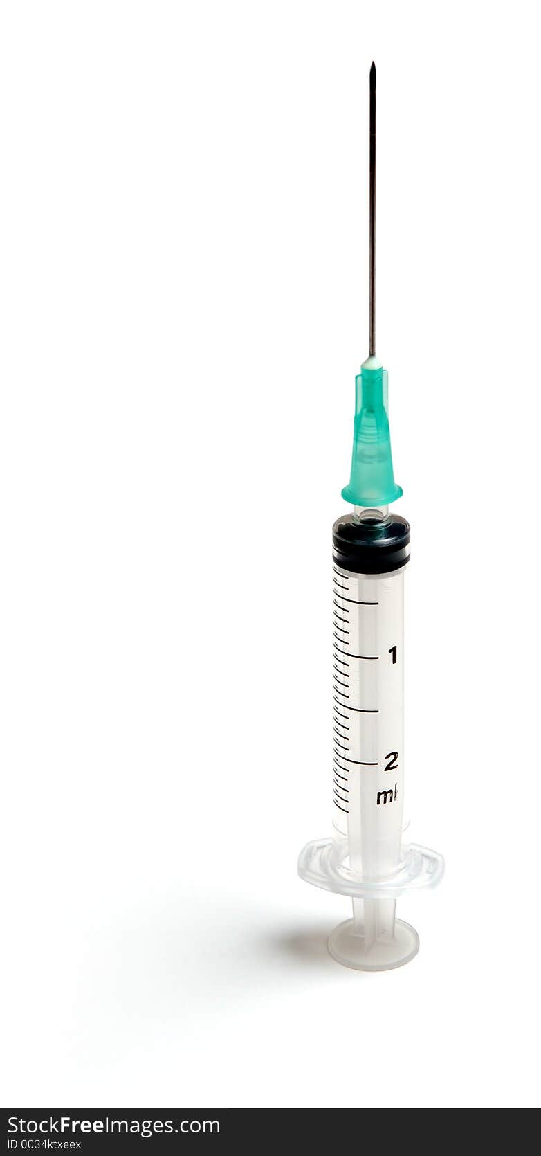 Hypodermic needle with 2ml syringe isolated on a white background.