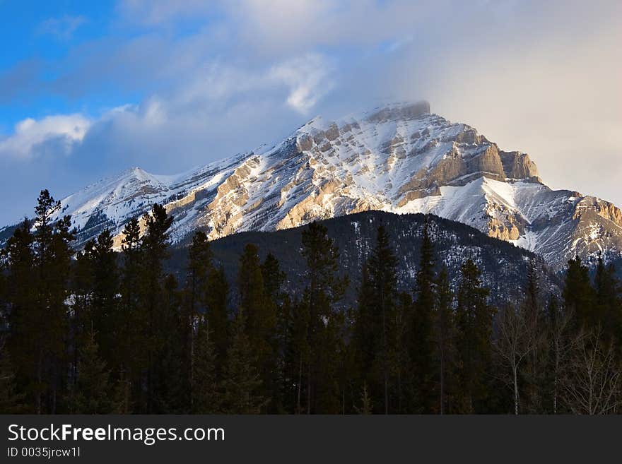 A snow covered peak early in the morning in Banff National Park, Canada.