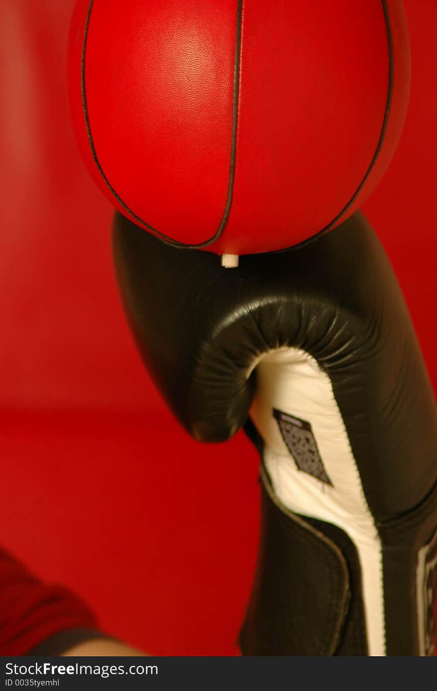 Lots of red black boxer gloves red speed bag still life. Lots of red black boxer gloves red speed bag still life