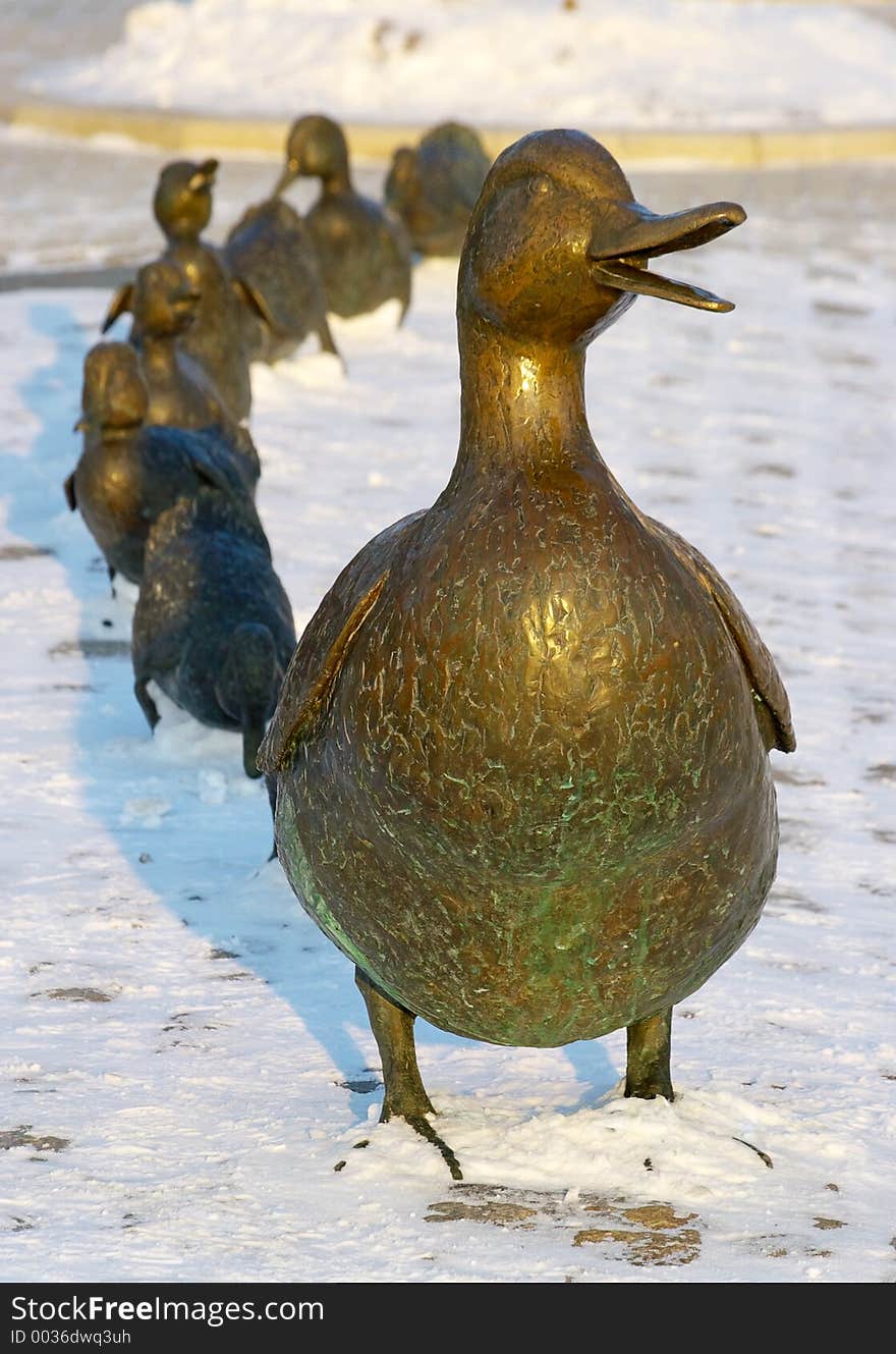 Bronze duck with her children