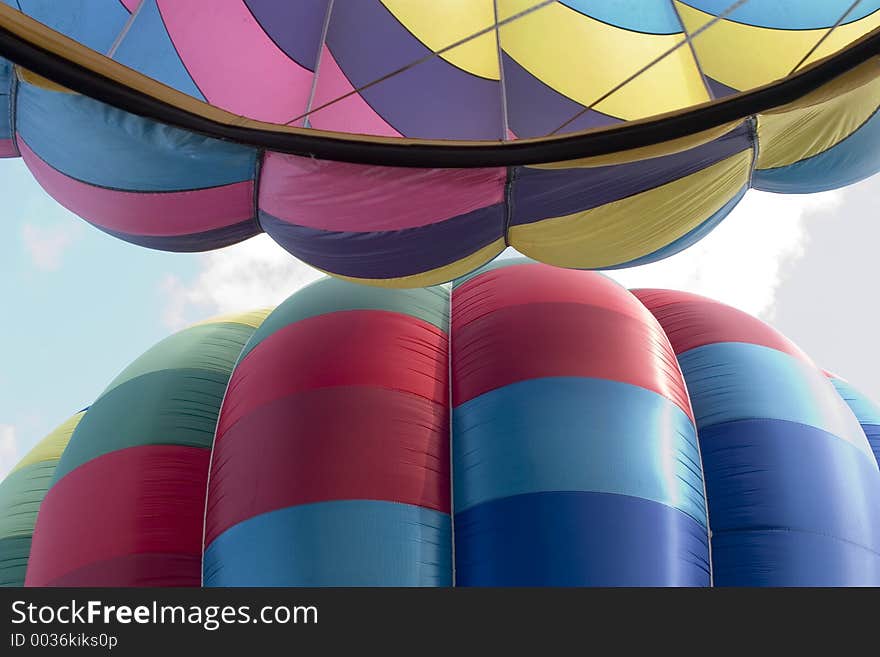 Edges of two hot air balloons seen from below. Edges of two hot air balloons seen from below