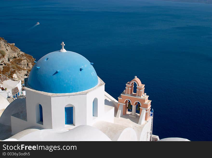 Church in Oia Santorini in front of the Mediterranian sea. Church in Oia Santorini in front of the Mediterranian sea