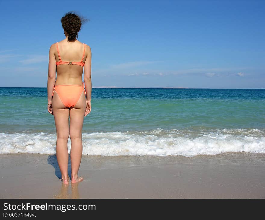 Behind girl on beach