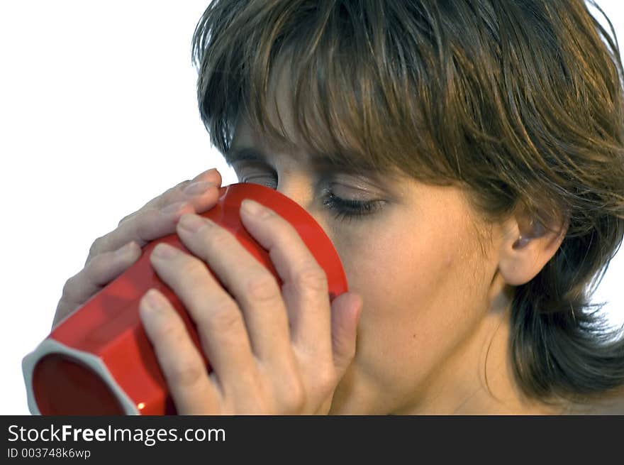 Girl having a drink, on a white background. Girl having a drink, on a white background.