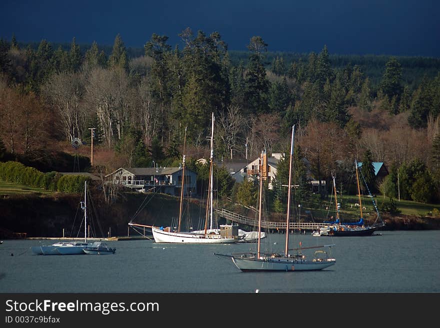 Sailboats in the harbor on a stormy day