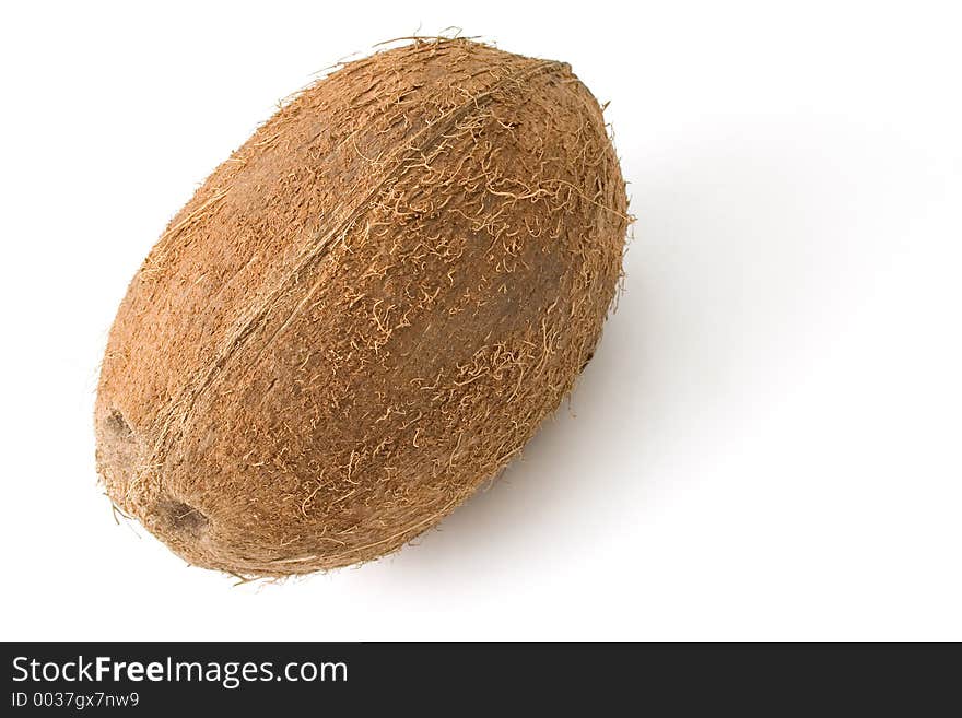 A coconut isolated on white background. A coconut isolated on white background