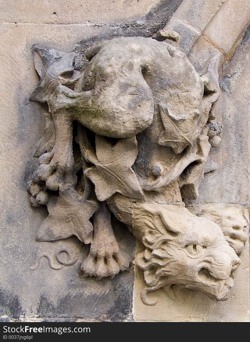 A gargoyle carved on the walls of St Martin's Church in Birmingham