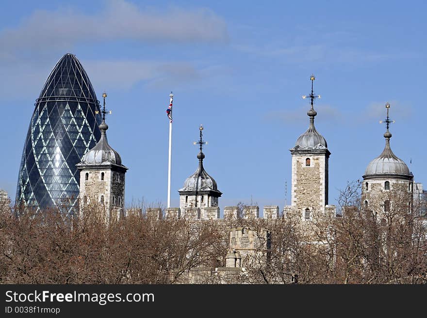 The ultra-modern 'Gherkin' looms behind the Tower of Lodon. The ultra-modern 'Gherkin' looms behind the Tower of Lodon