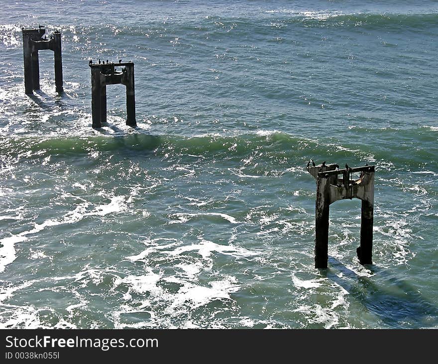 A derelict pier, in the pacific, near Davenport, California.