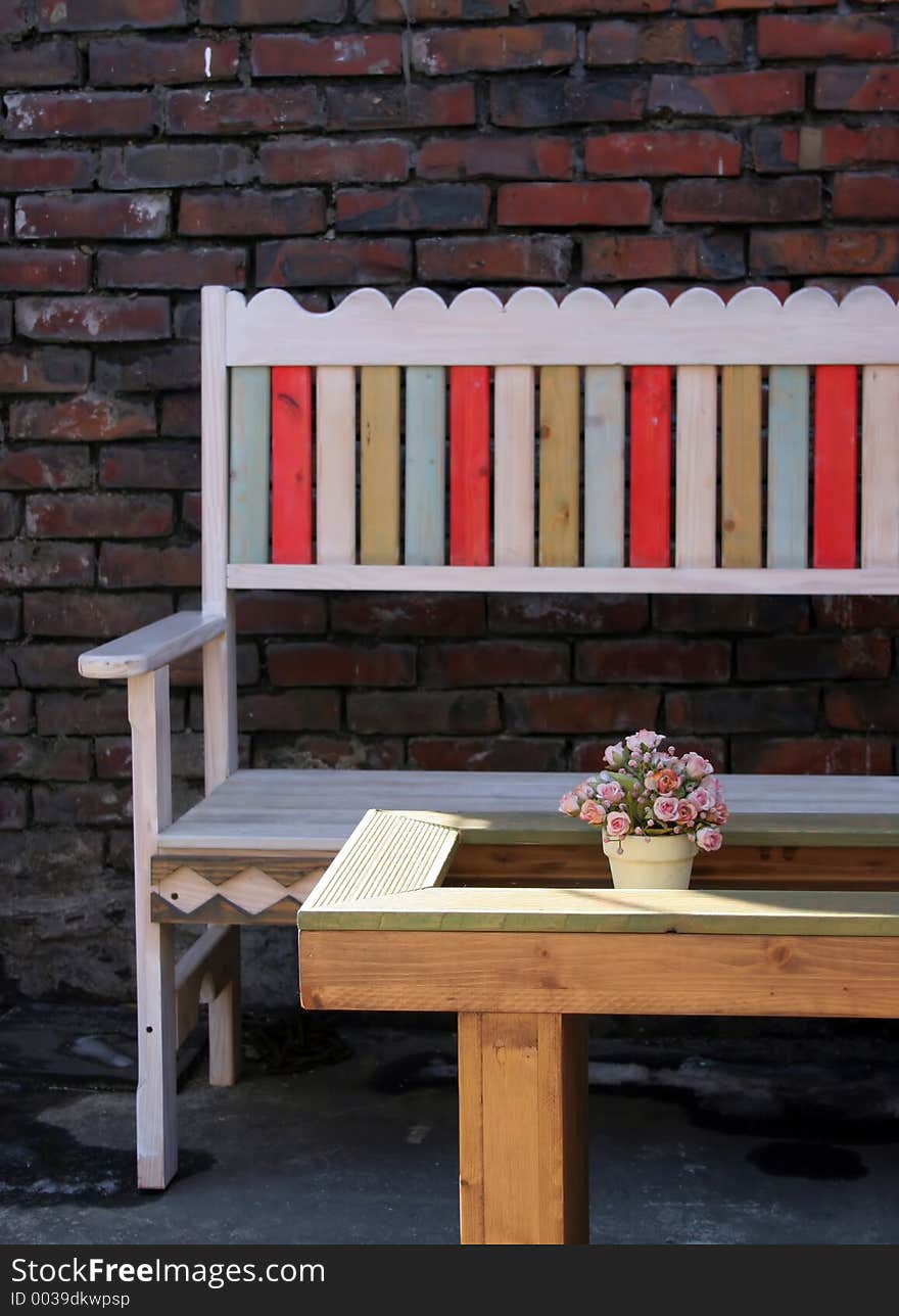 Colorful wooden bench and table. Colorful wooden bench and table