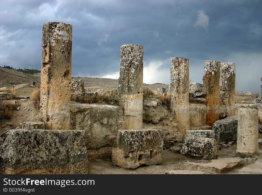 An ancient Roman city, Turkey, peak of Pamukkale mountain. Shortly before thunderstorm. An ancient Roman city, Turkey, peak of Pamukkale mountain. Shortly before thunderstorm