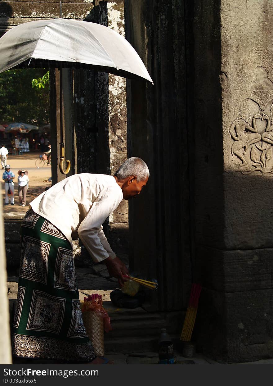 Nun at Angkor Thom, Cambodia. Nun at Angkor Thom, Cambodia.