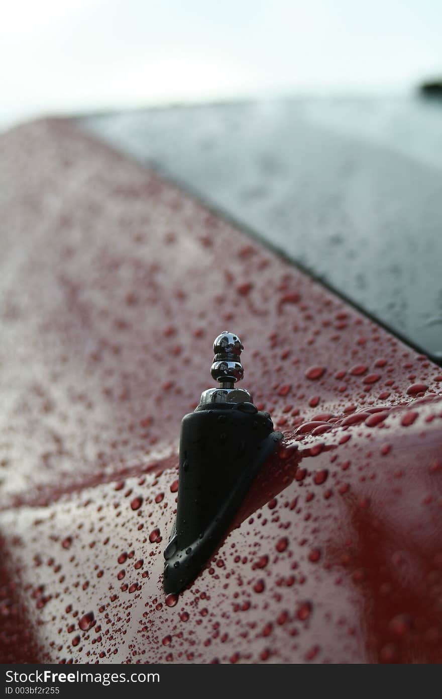 A drawn-in antenna with raindrops at the car. A drawn-in antenna with raindrops at the car.