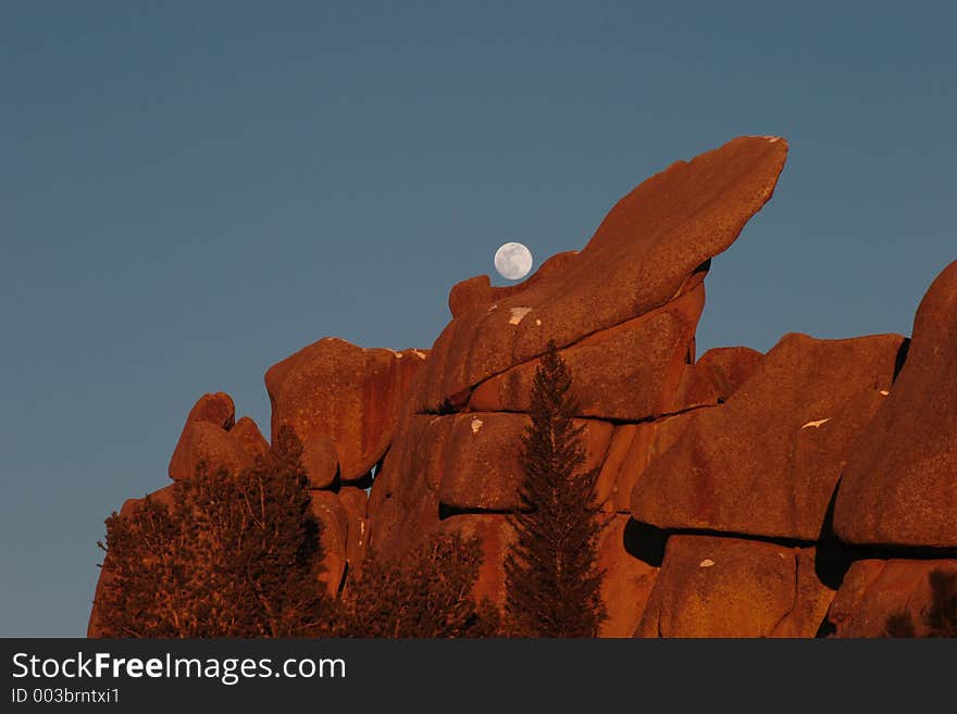 Sunset and moonrise, Vedauwoo rock climbing area, Medicine Bow National Forest, Wyoming. Sunset and moonrise, Vedauwoo rock climbing area, Medicine Bow National Forest, Wyoming