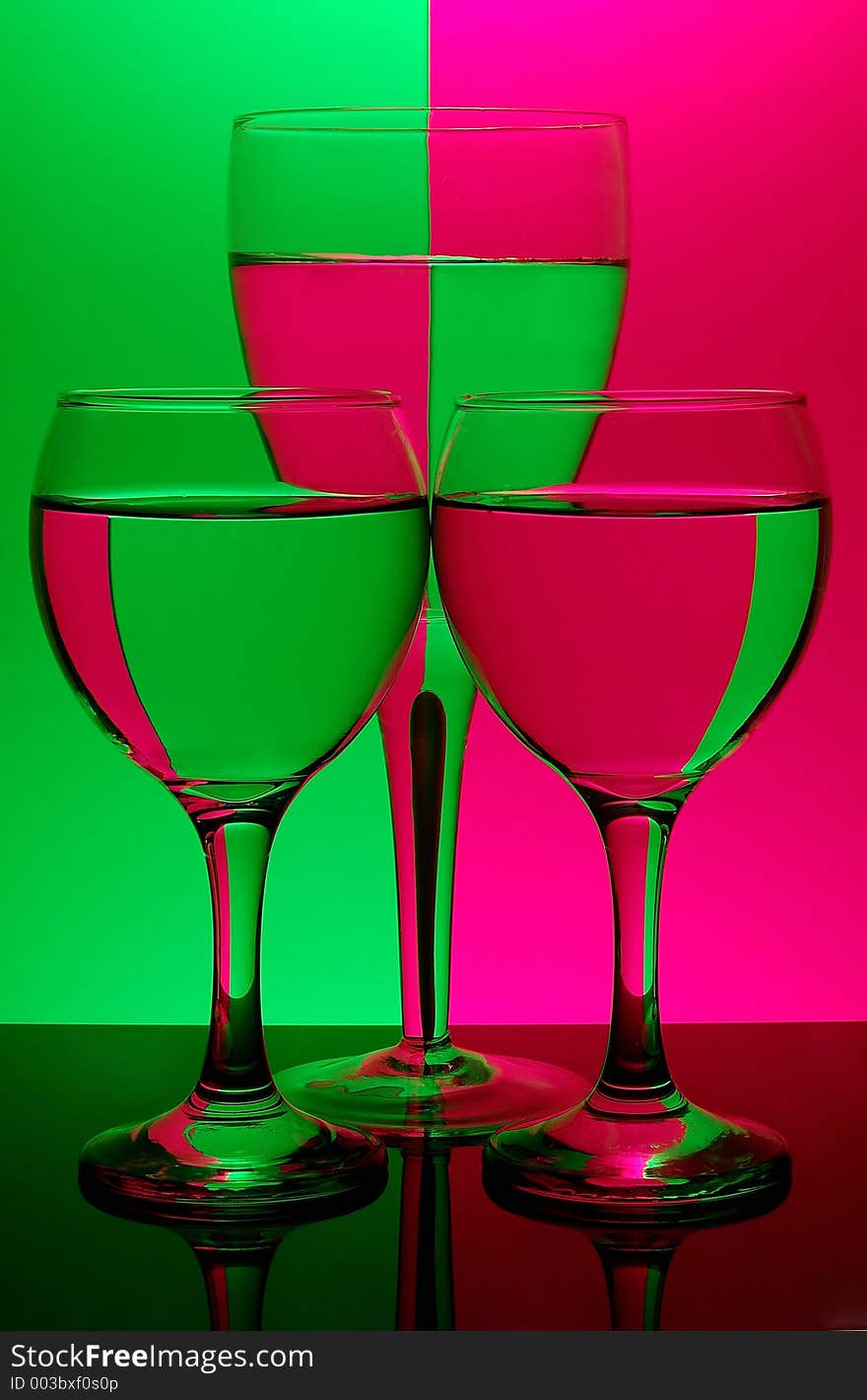 Three glasses on neon background - see portfolio for more views