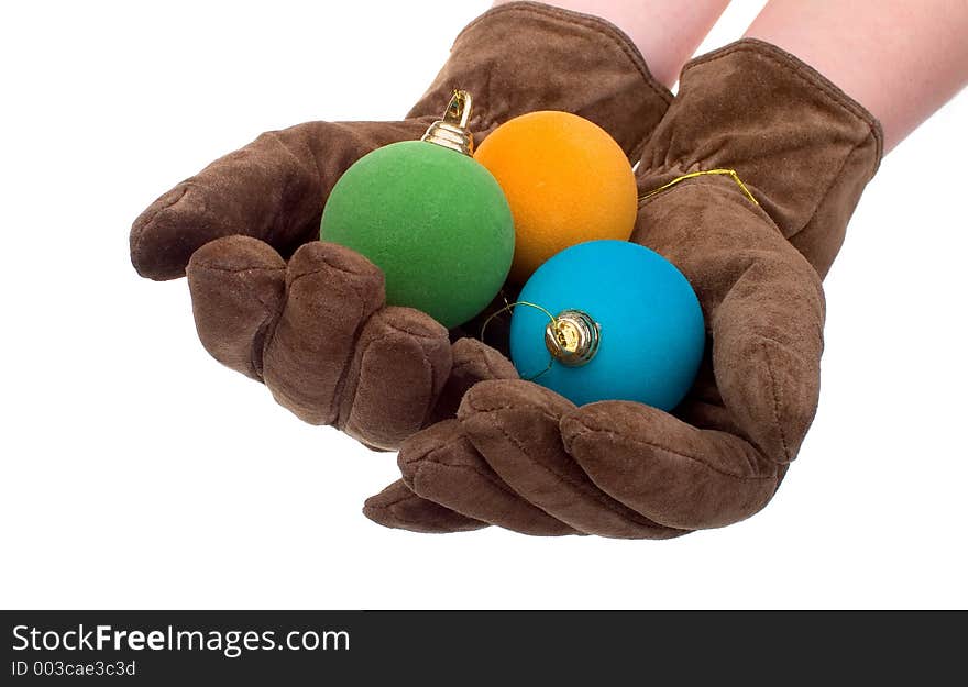 Gloves and christmas balls