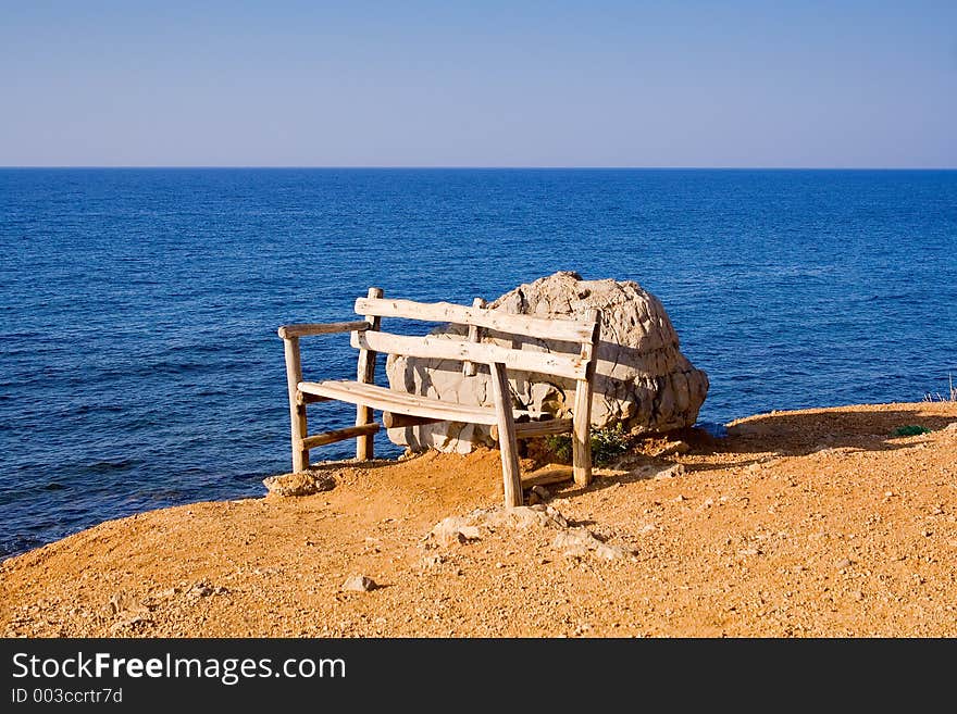 Lonely bench at the seaside. Lonely bench at the seaside.