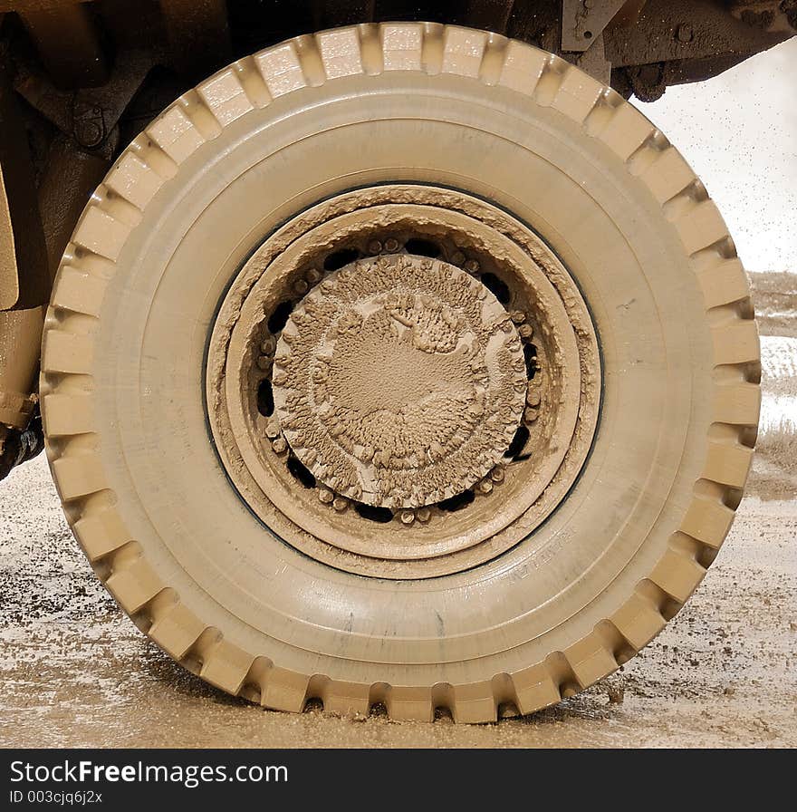 Wheel on a dump truck. Wheel on a dump truck