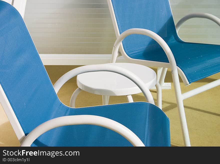 Chairs and table on a balcony. Chairs and table on a balcony