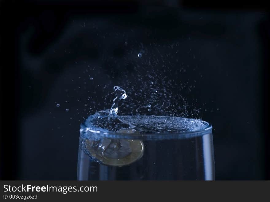 Coin in water