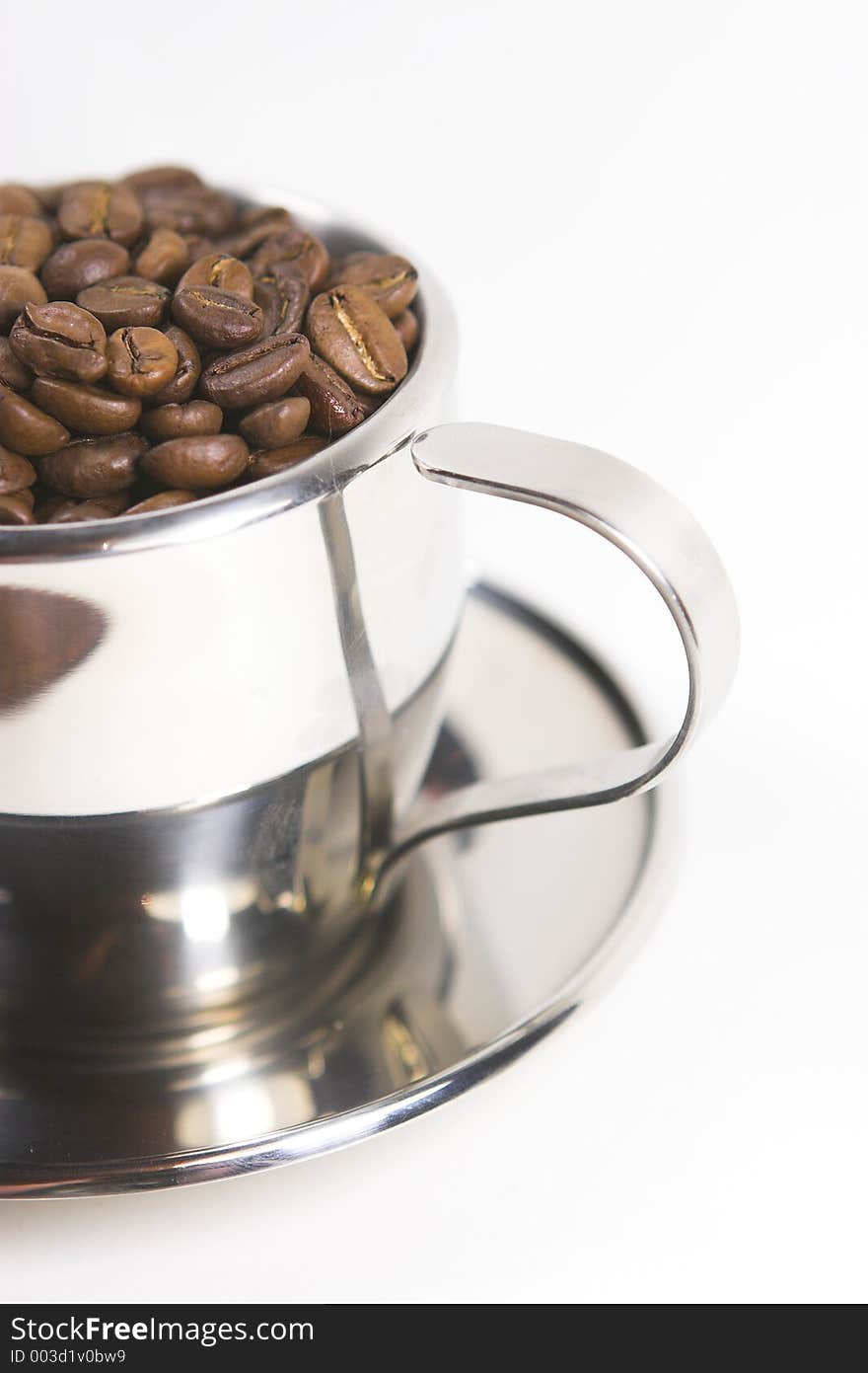 Coffee beans in a cup.