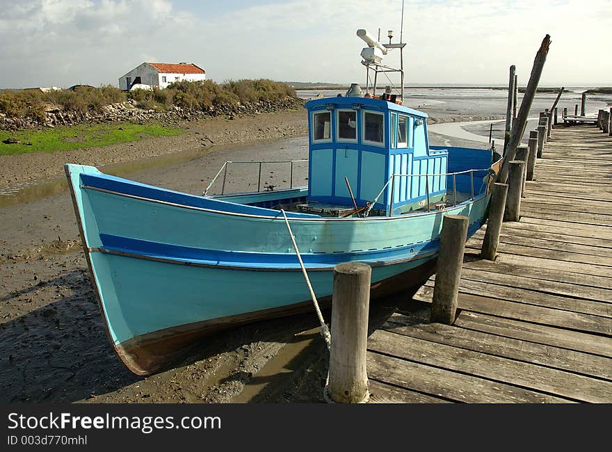 Typical fishing boat in Sado Estuary Natural Reserve doc - Setúbal district - Portugal