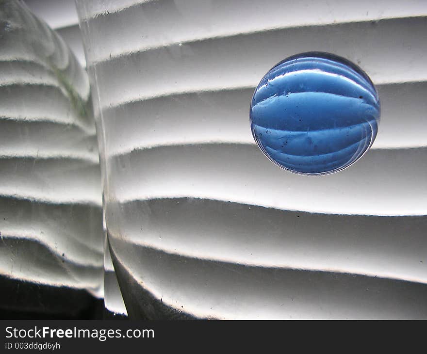 Still life with blue glass ball