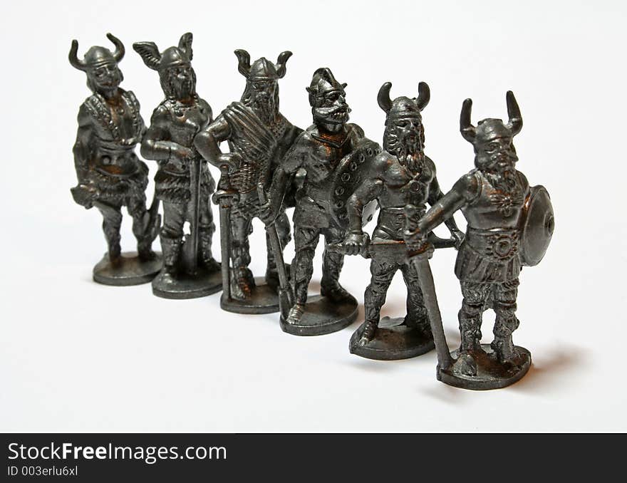 A miniature sculpture of ancient warriors. A miniature sculpture of ancient warriors