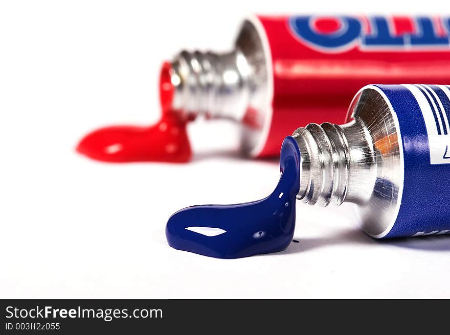 Blue and red paints in tubes