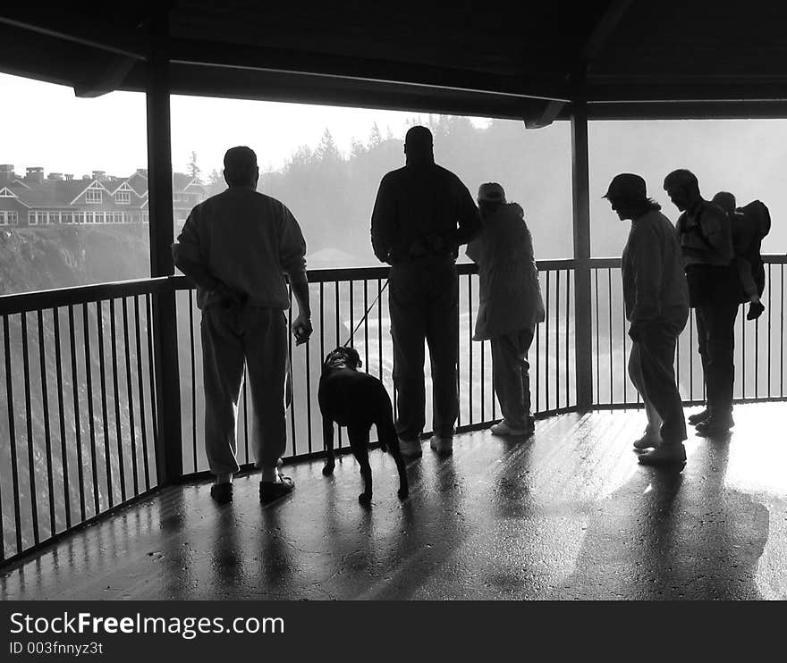 Observing people on an observation deck at Snoqualmie Falls in Washington State, USA.