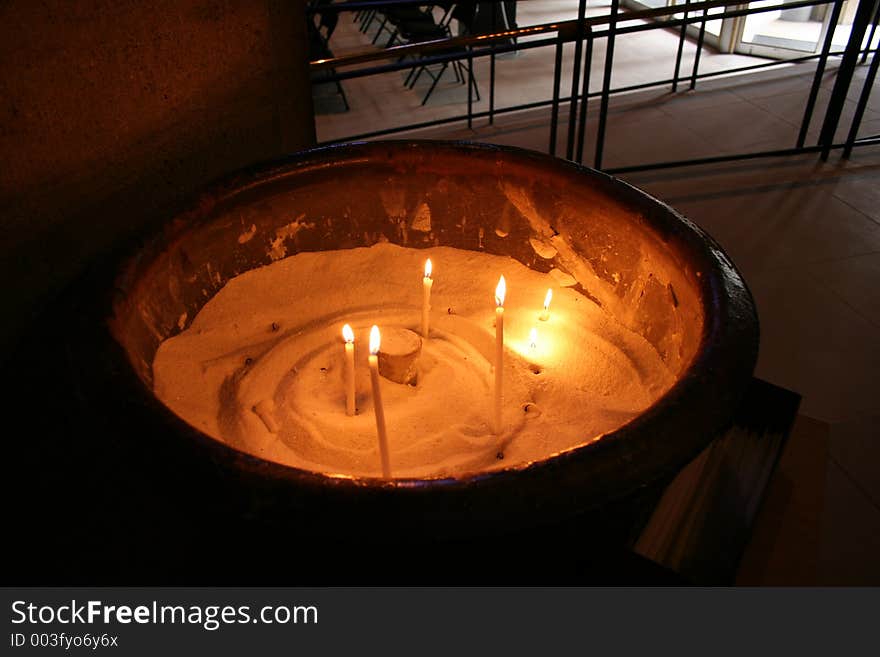 Candles on the sand