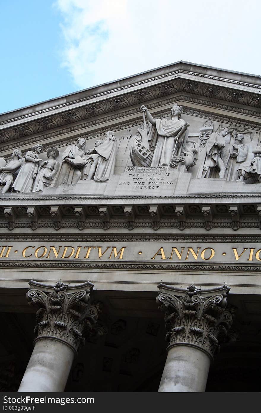 Image of stone work statues on an old building. Image of stone work statues on an old building