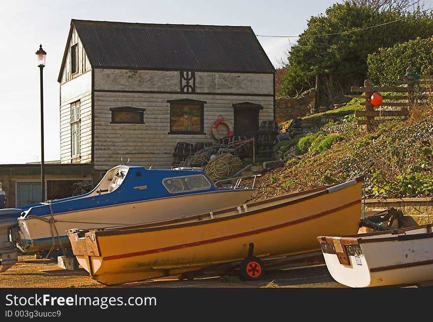 Boats with old boatshed. Boats with old boatshed