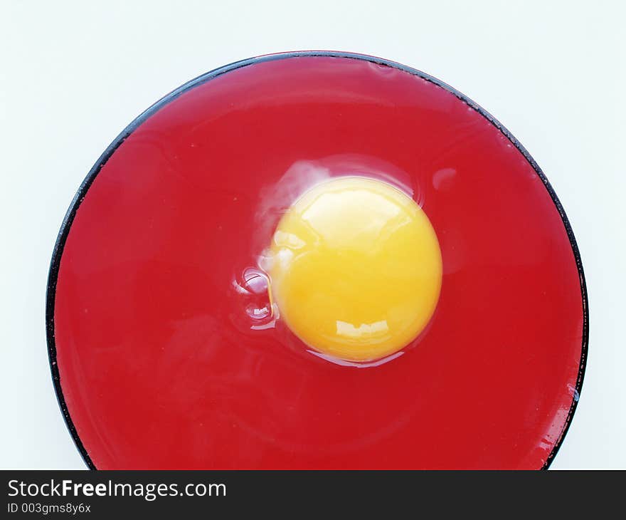 Still life with egg on red and white colors. Still life with egg on red and white colors