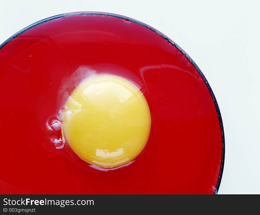 Still life with egg on red and white colors. Still life with egg on red and white colors