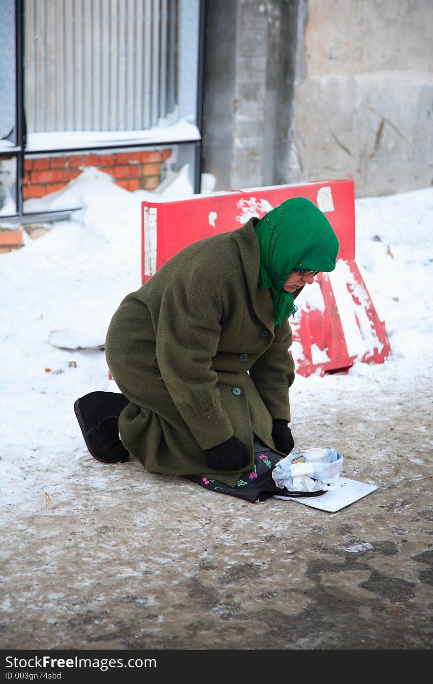 In the Moscou Metro this man is asking for money with cold temperature reaching -12?C. He protect his feet with an old trousers on which he has a disease. In the Moscou Metro this man is asking for money with cold temperature reaching -12?C. He protect his feet with an old trousers on which he has a disease.