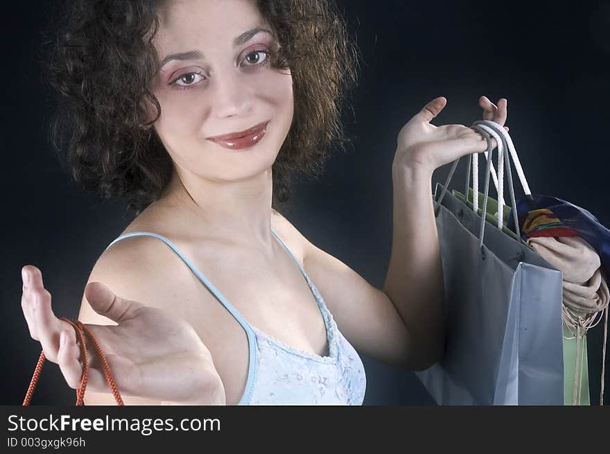 Young woman happy about her shopping. Young woman happy about her shopping.