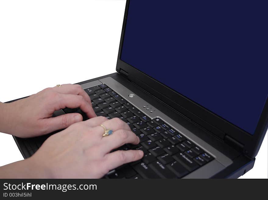 Hands typing on keyboard of a laptop. Hands typing on keyboard of a laptop