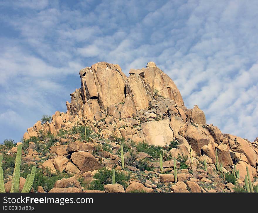 Mountain in the Arizona Desert against a blue sky background. Mountain in the Arizona Desert against a blue sky background