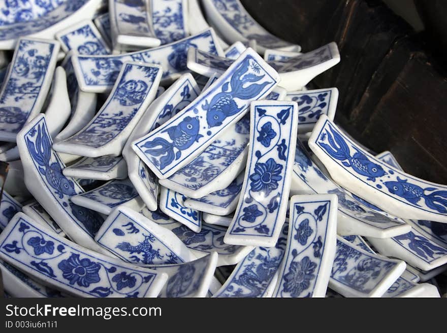 Blue china chopstick rests with fish design