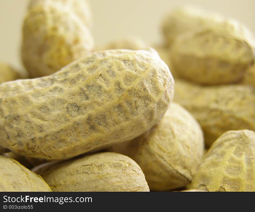 Closeup of peanuts in bowl.