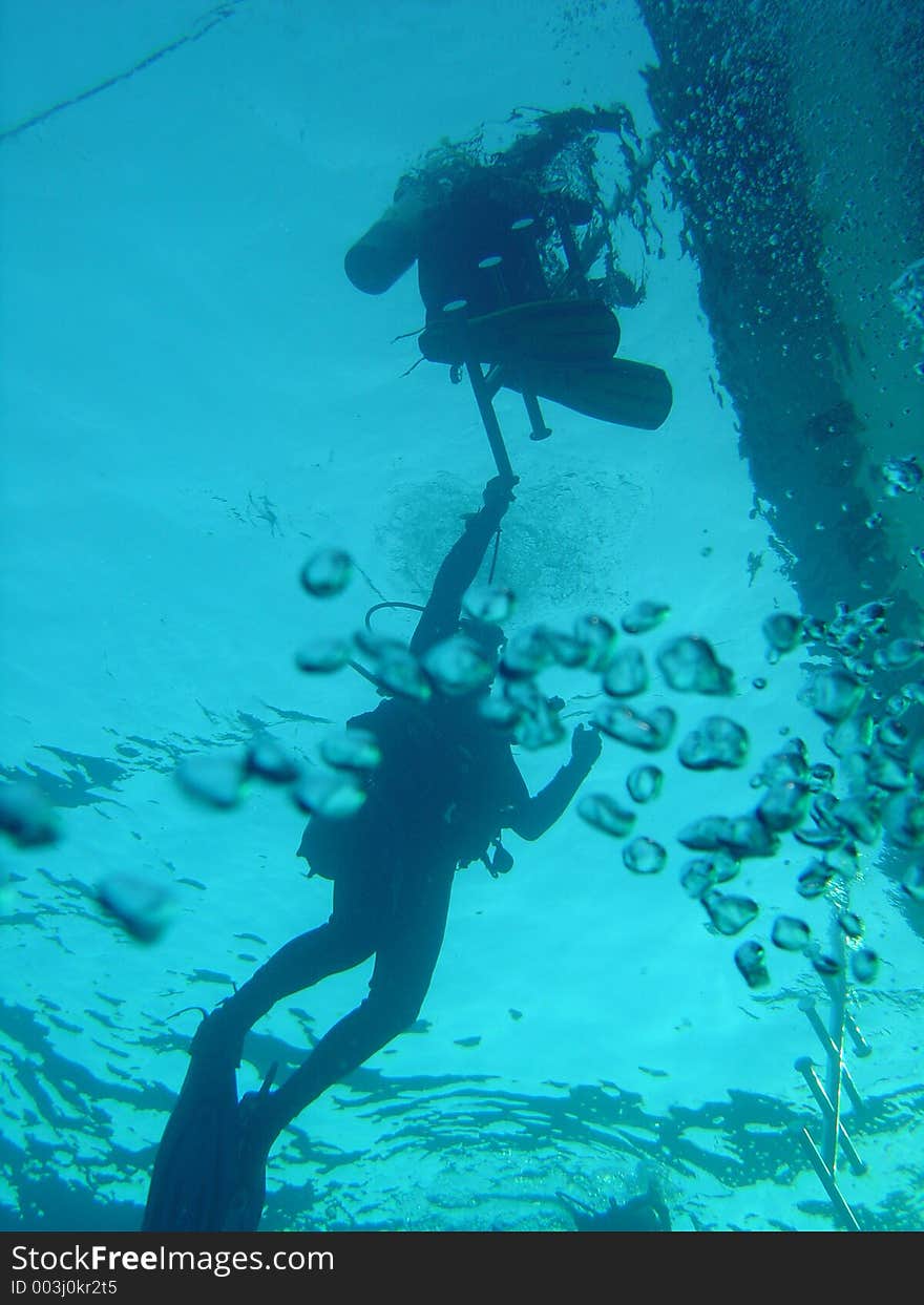 Pair of divers returning to their boat