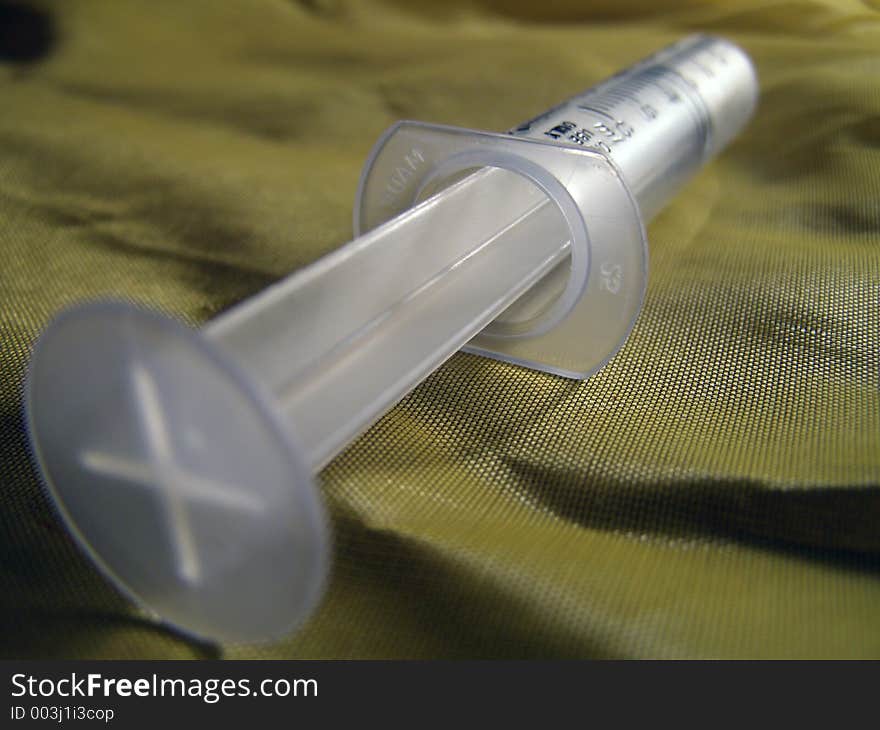 Closeup of syringe.