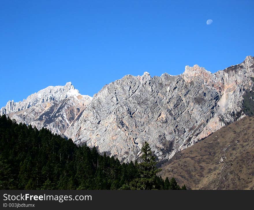 Moon over mountains