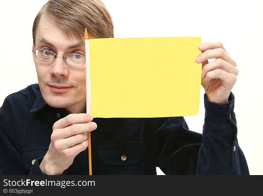 Man shows clean yellow flag. Man shows clean yellow flag