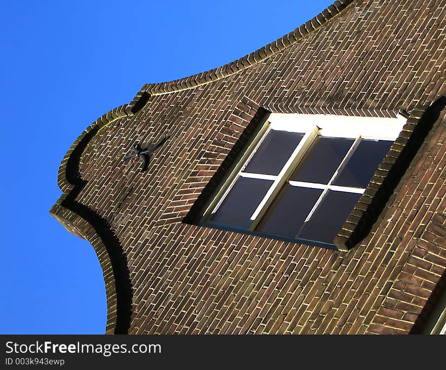 The façade of an historic Flemish house in Holland