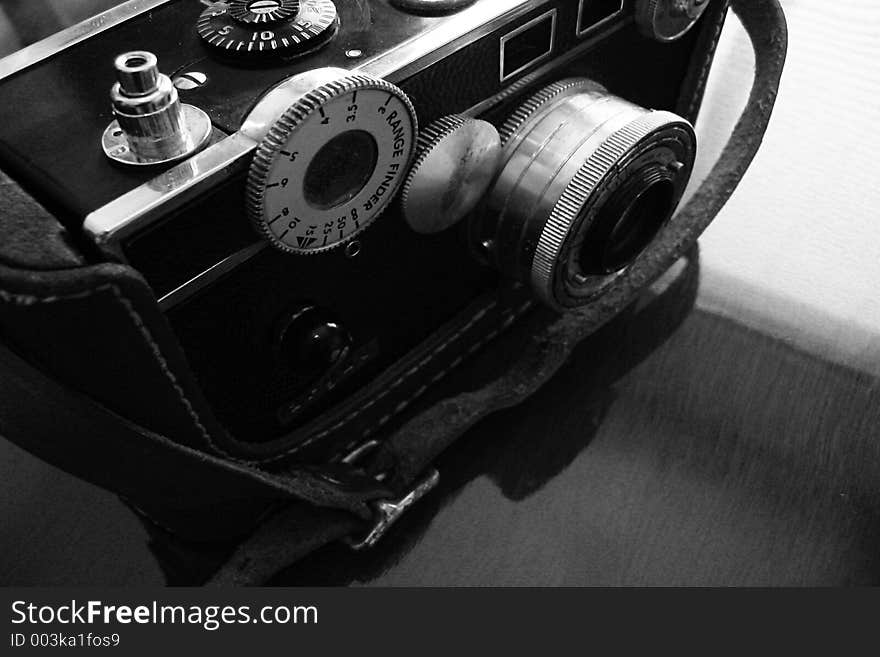 Vintage rangefinder camera ca. 1939 shown in black and white in hard focus. Vintage rangefinder camera ca. 1939 shown in black and white in hard focus.